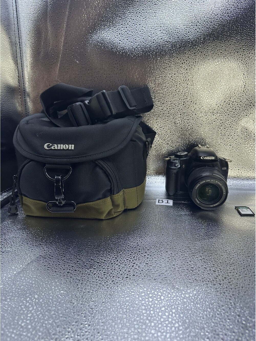 Canon EOS Rebel XS DSLR Camera w/ 18-55mm Lens, 32GB Card & Bag - B1